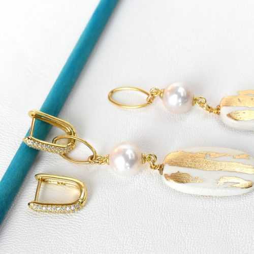 Orecchini pendenti trasformabili con perla